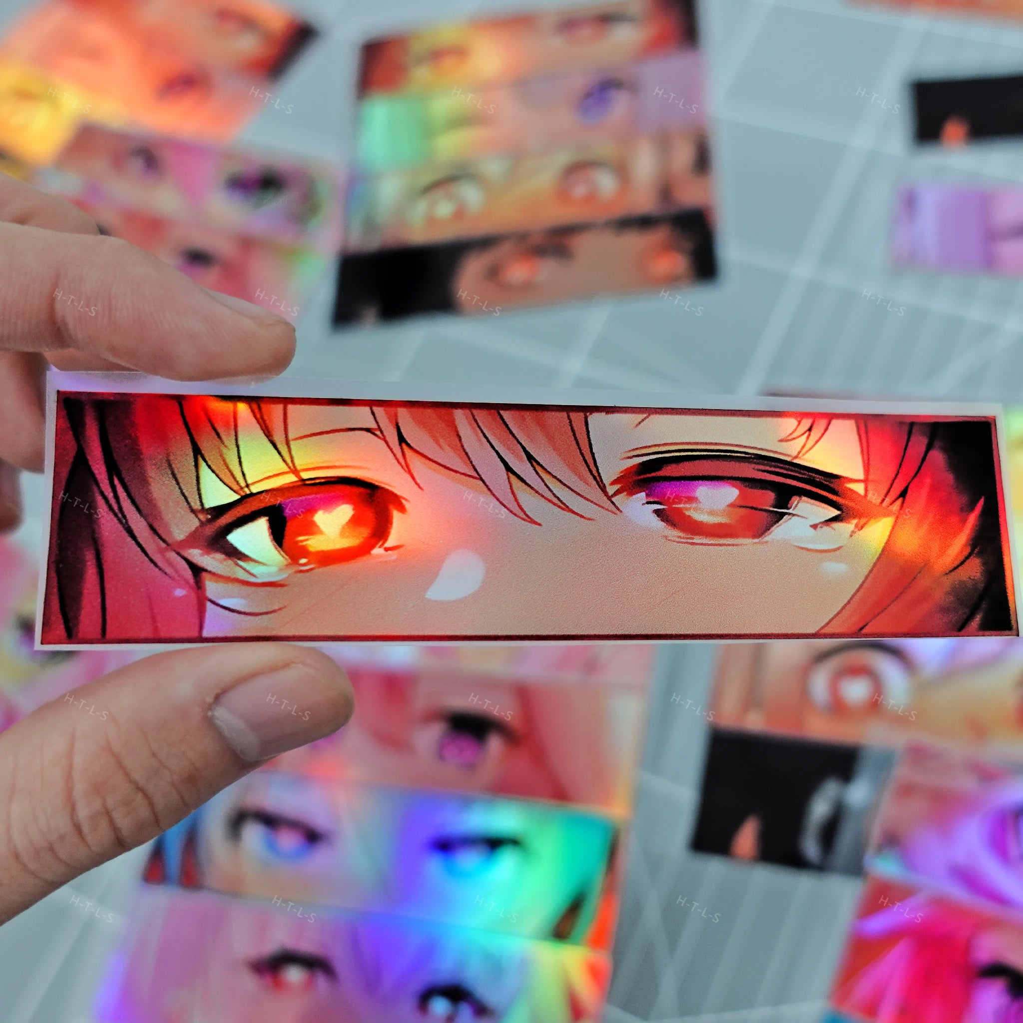 Anime sticker collection with expressive eye designs and rainbow holographic effects