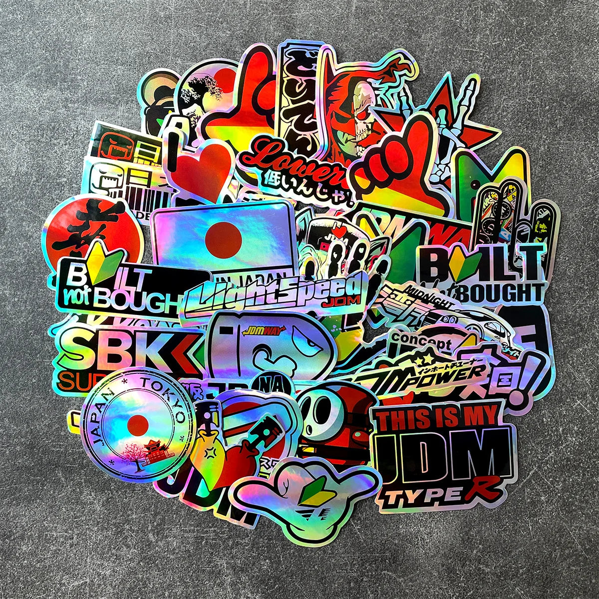 Assorted holographic JDM stickers with Japanese car culture designs