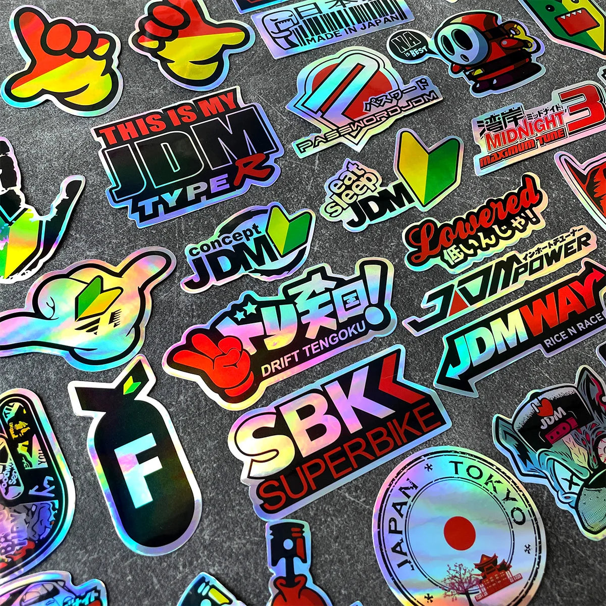 Assorted holographic JDM stickers with Japanese car culture designs