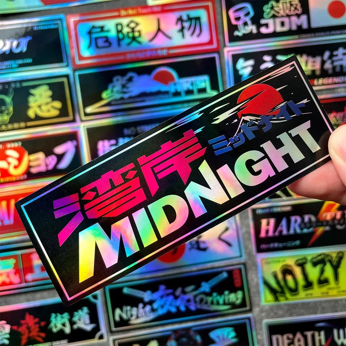 Premium holographic JDM stickers with Japanese street culture and kanji designs