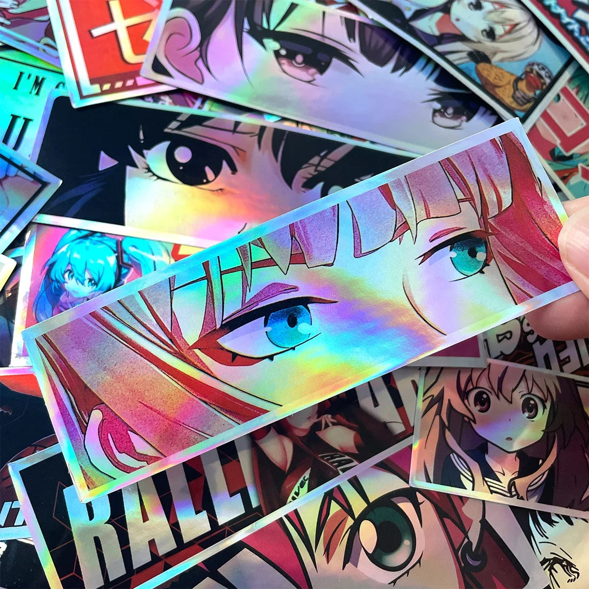 Holographic anime vinyl decals for laptops, cars, and gaming setups